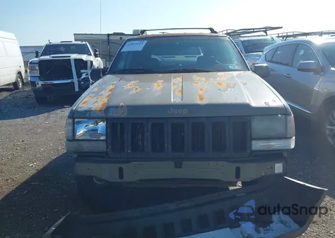 1997 Jeep Grand Cherokee Limited z USA, uszkodzony, nr VIN 1J4GZ78Y5VC613495